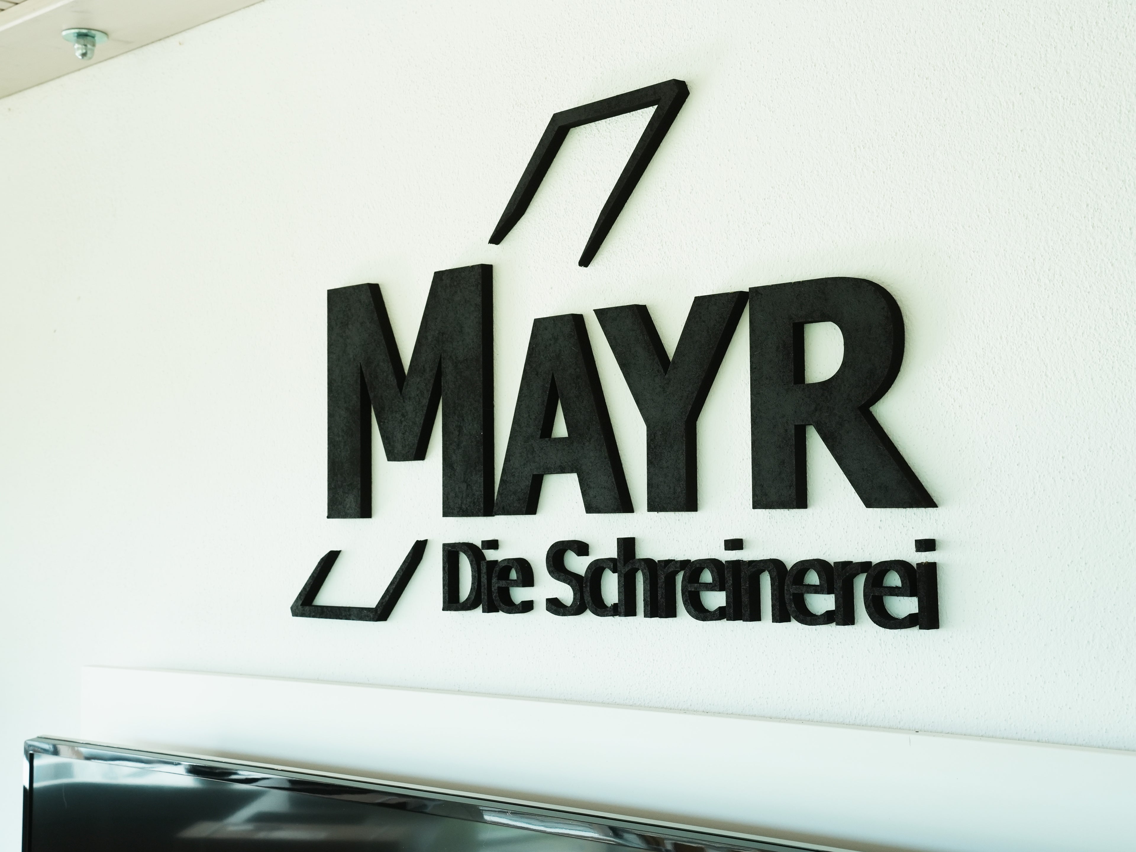 Wandlogo 3D Effekt schwarz